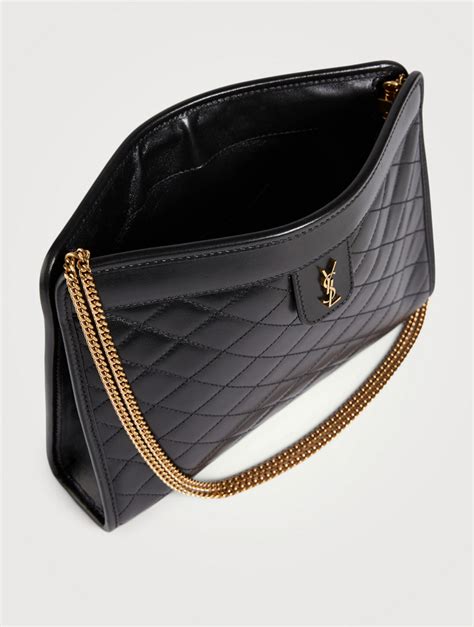 ysl black gold clutch|YSL monogram quilted clutch.